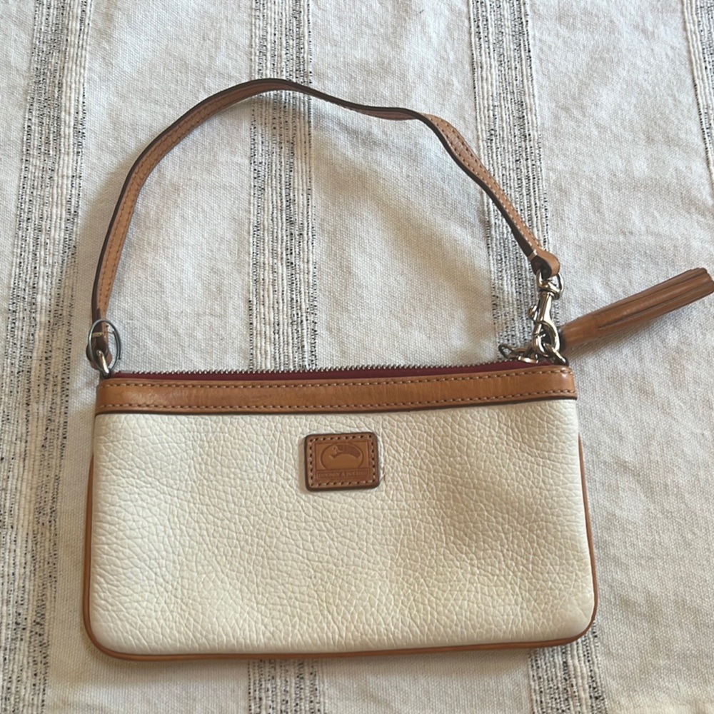 Dooney & Burke wristlet. Excellent condition. Used twice.